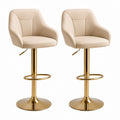 Set di 2 sgabelli da bar girevoli e regolabili in pelle sintetica beige e acciaio dorato, 52 × 52 × 86–107 cm